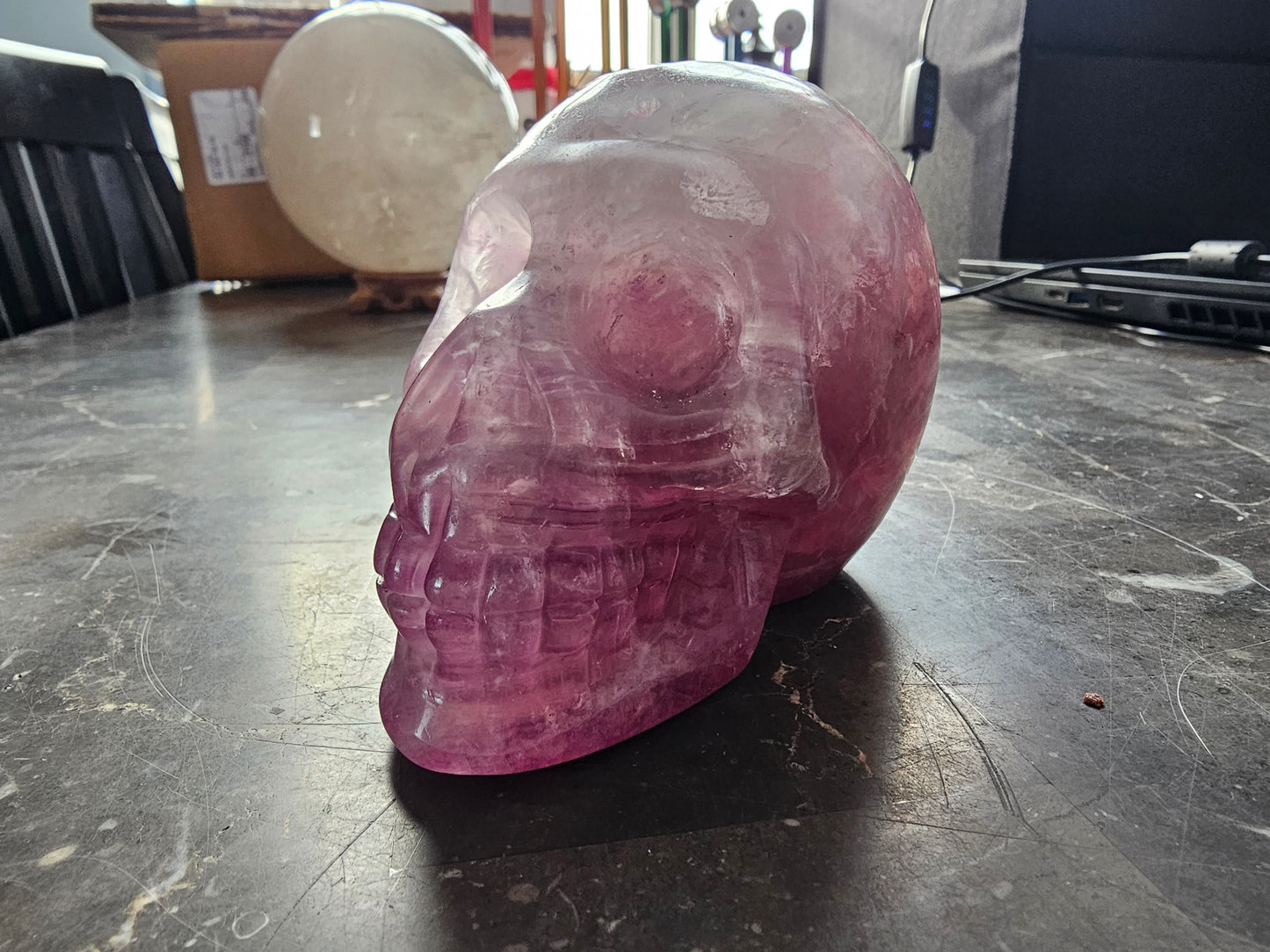 4.8" Rainbow Fluorite Skull w/ Rainbows