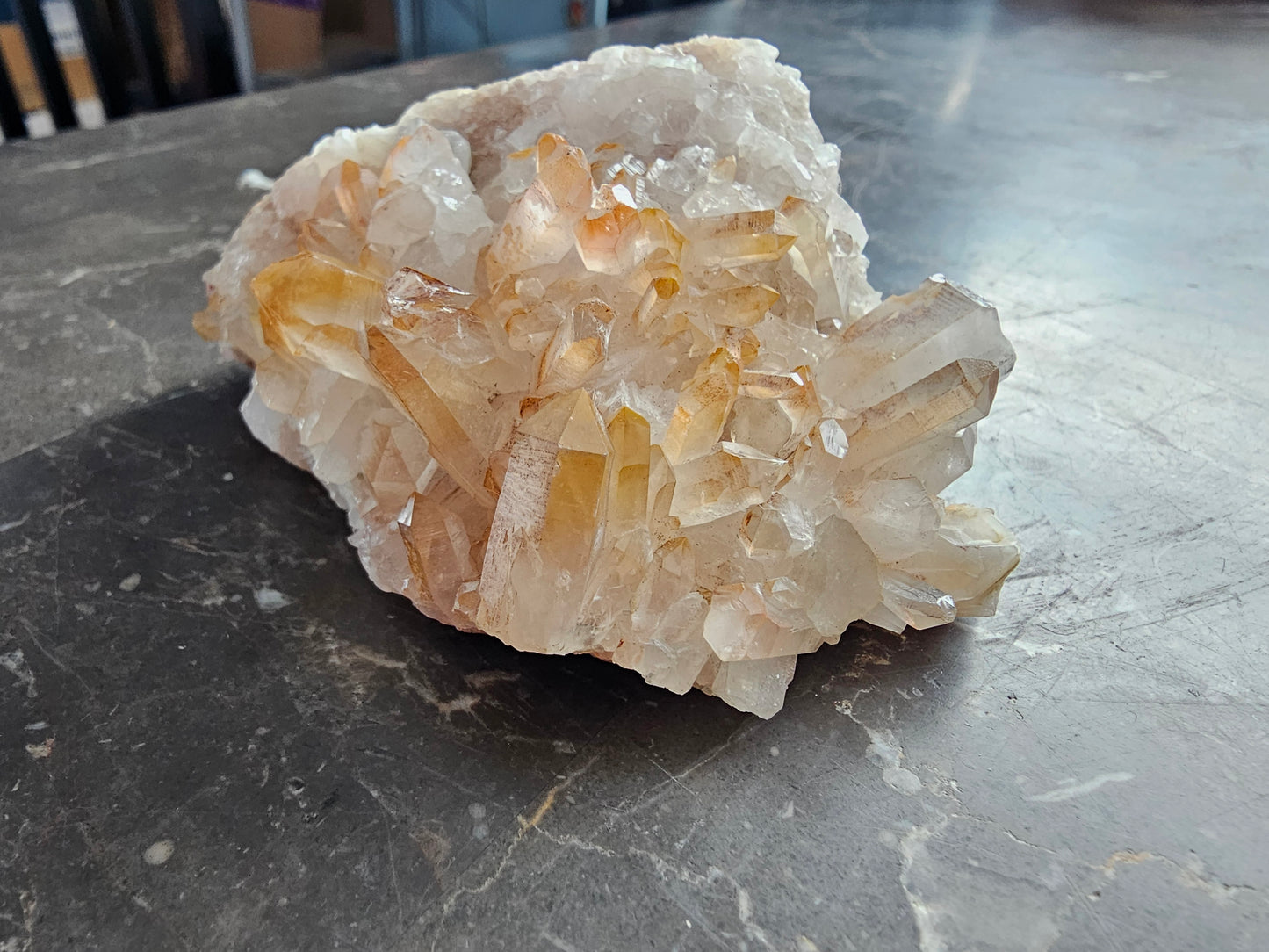 Quartz Cluster w Golden Healer Skull Carving on Matrix