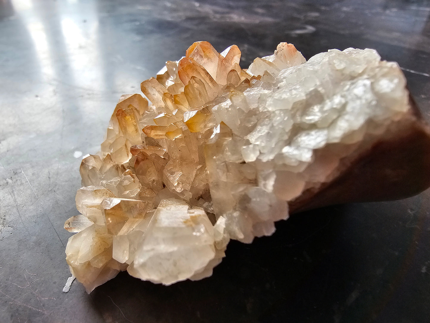 Quartz Cluster w Golden Healer Skull Carving on Matrix