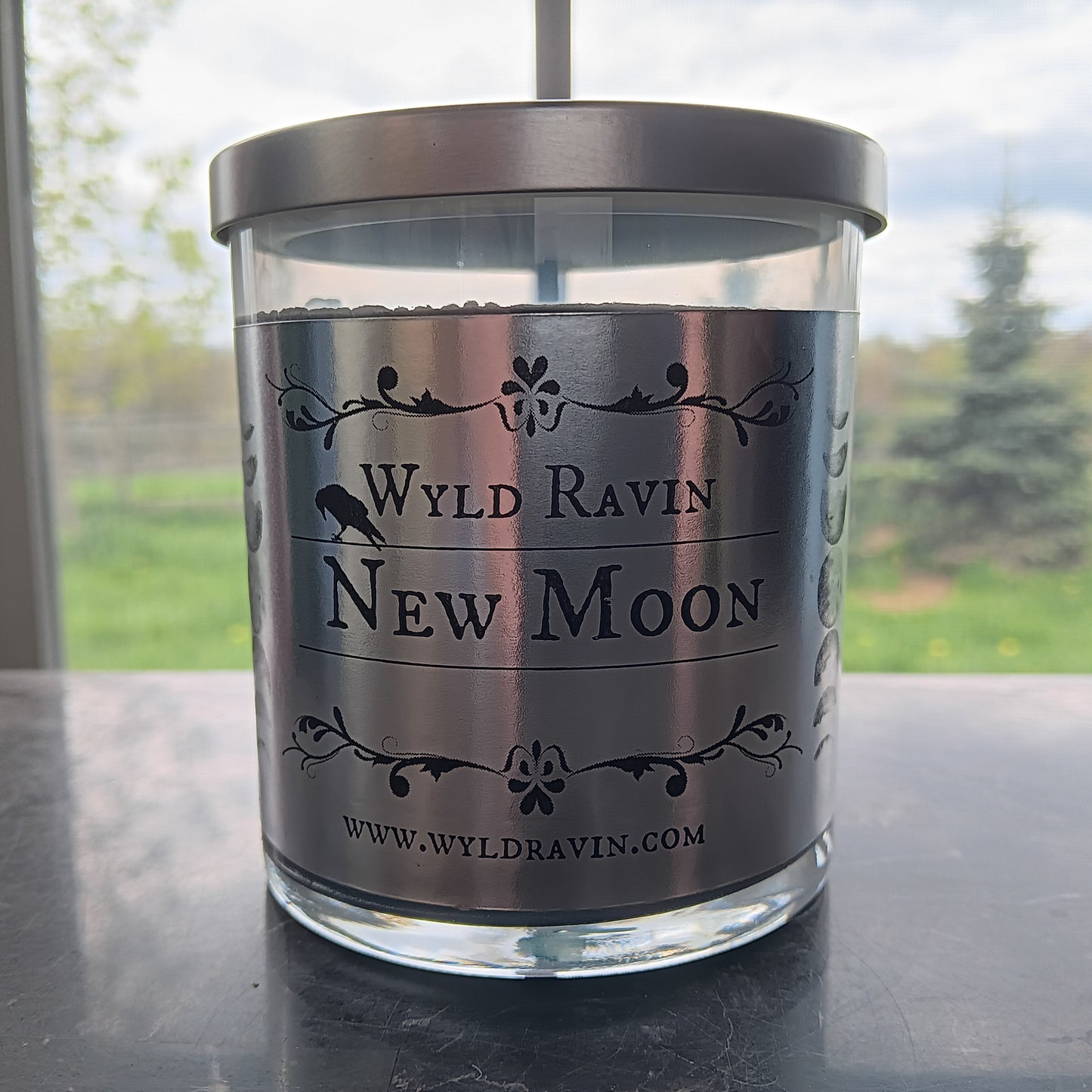 Vela de luna nueva de Wyld Ravin