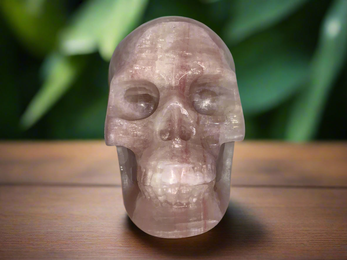 5.3" Pink Calcite Skull w/ Rainbows