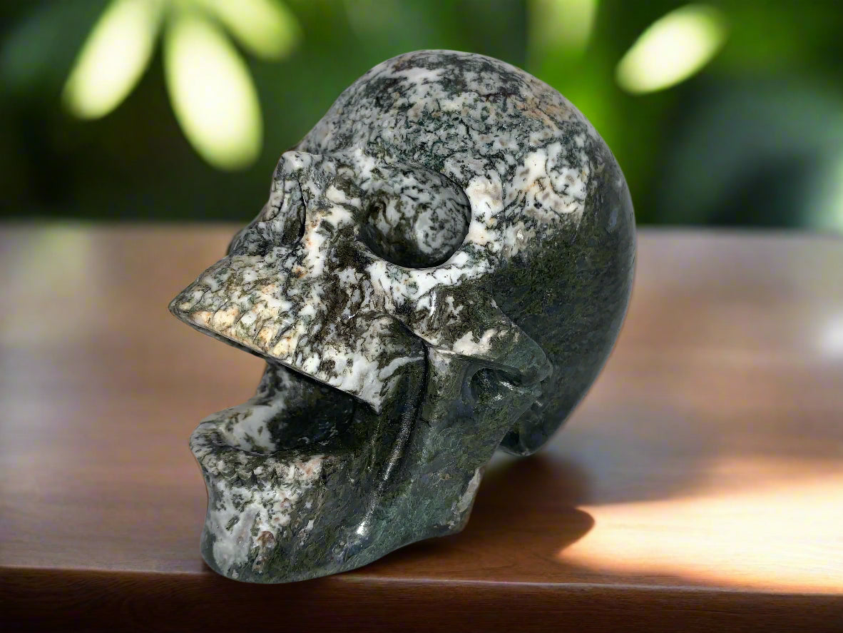 5.6" Moss Agate Singing Skull