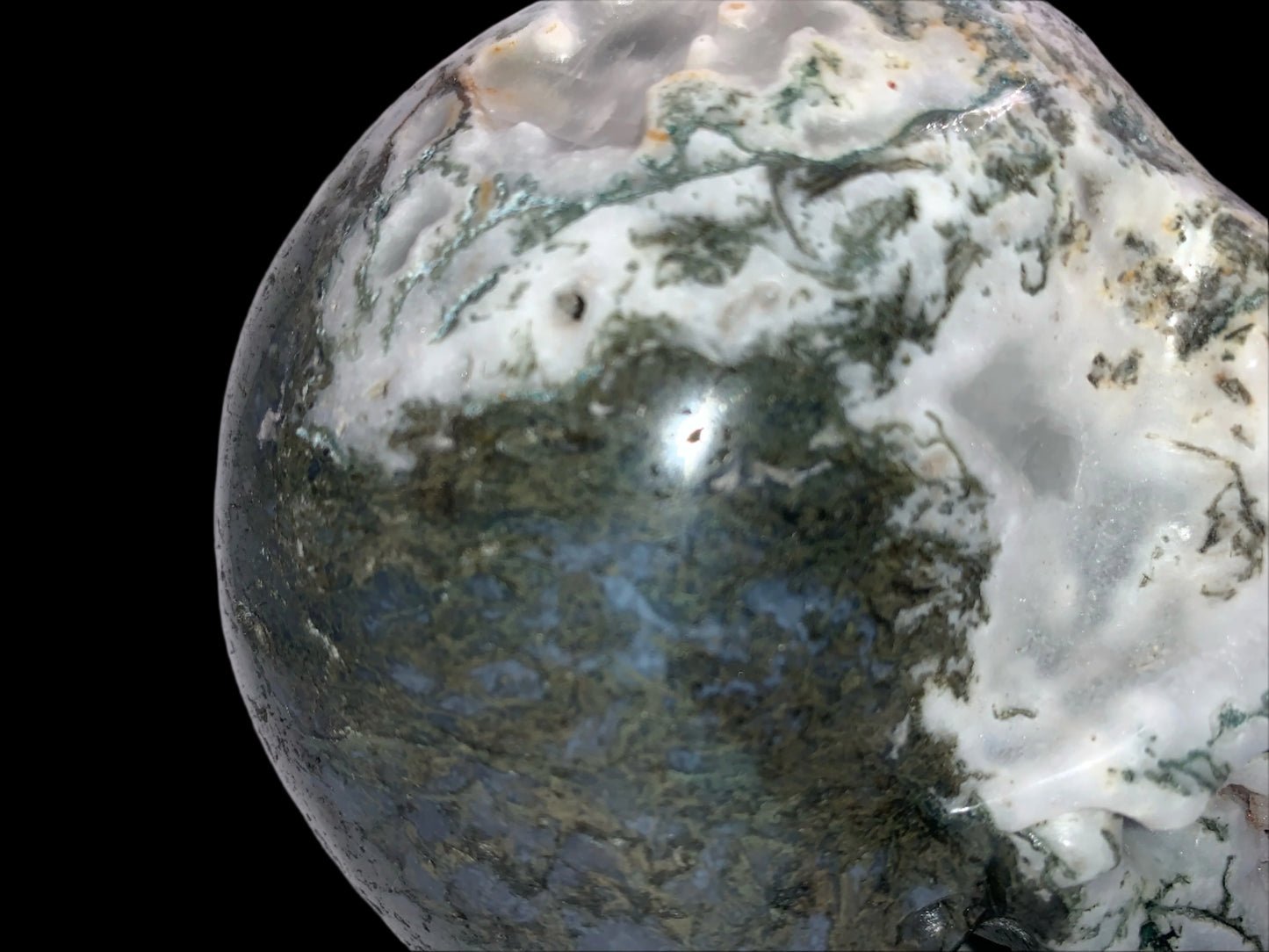 5.6" Moss Agate Singing Skull