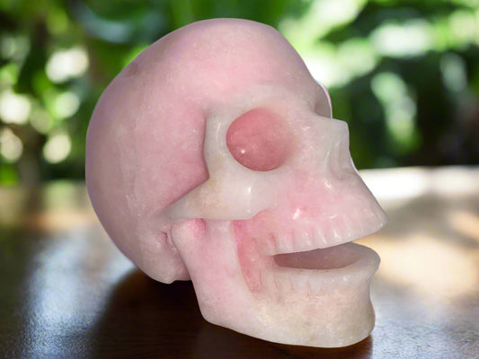 Cráneo sonriente de aragonita rosa de 5,2" poco común